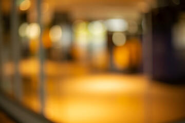 Background, texture, blurred background inside the shopping mall,Background concept, pattern bokeh bright image at room, store, cafe, for use as a background design.