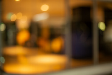 Background, texture, blurred background inside the shopping mall,Background concept, pattern bokeh bright image at room, store, cafe, for use as a background design.