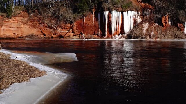 Icefall by Salaca river in spring