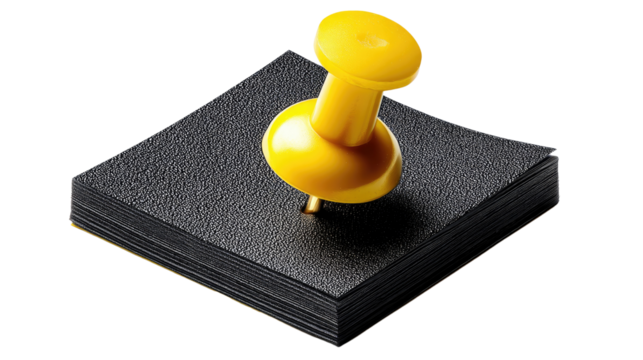 A yellow pushpin on a pile of black square sticky notes. Symbol of organization, reminder, tasks, memo, to do list, office supplies concept. 