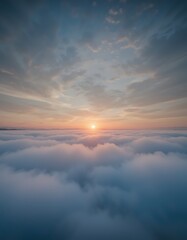 Fototapeta premium Sunrise Above the Clouds A Breathtaking Aerial View of a Serene Landscape