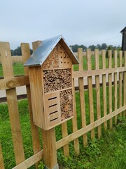 Charming Wooden Insect Hotel: An Eco-Friendly Haven to Support Garden Biodiversity and Wild Bees