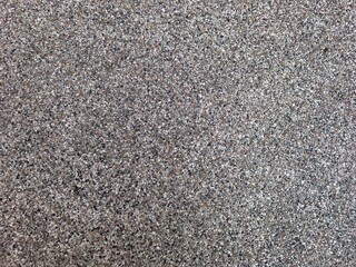 Multicolored Pebble Texture in Concrete Surface