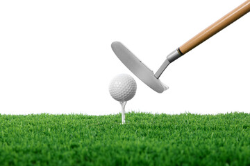 Hitting golf ball with club against white background