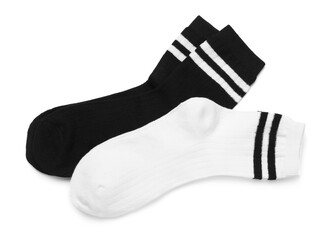 Pairs of stylish socks isolated on white, top view