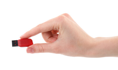 Woman holding usb flash drive on white background, closeup