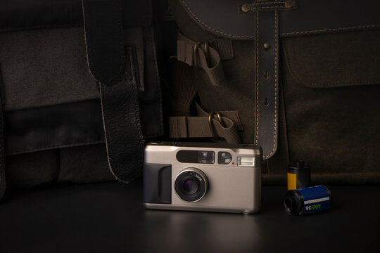 Close-up of a 1990s Premium Titanium Film Compact Camera, Luxury 35mm Point-and-Shoot Camera