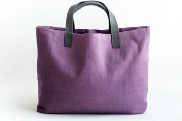Naklejka premium Purple tote bag made of a natural fabric like linen, with gray handles. The bag is empty and ready to be filled with your necessities.