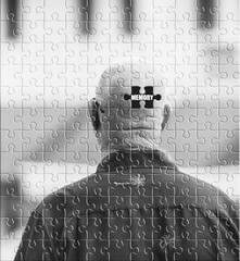 Elderly man with missing memory puzzle piece – concept of dementia, alzheimer’s, and memory loss