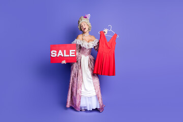 Historical reenactor in elegant costume advertising a dress sale against a purple background