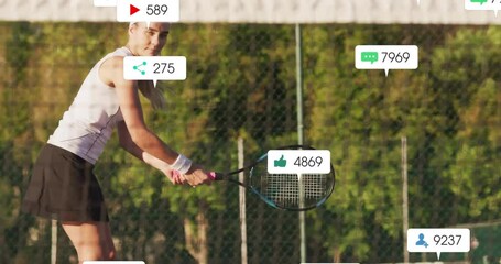 Female tennis player preparing backhand outdoors, showing animated marketing social media icons - Powered by Adobe