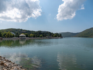 Picturesque view of embankment of lake Abrau on sunny day in Abrau Durso