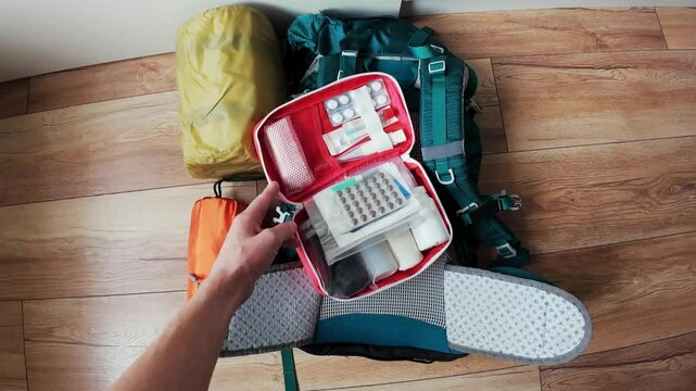 A wellequipped first aid kit in your backpack is crucial for hiking or camping, ensuring safety and providing essential medical supplies for emergencies during outdoor adventures