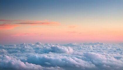 this is exactly what heaven looks like looking over the top of a blanket of gorgeous pastel coloured fluffy clouds depicting heavenly lansdcape background ideal for a spiritual theme