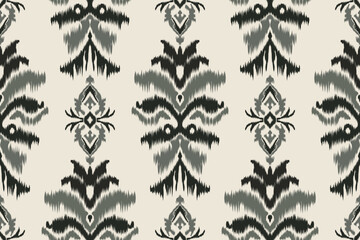 Seamless ikat pattern with symmetrical motifs, perfect for traditional fabric wallpaper designs, tribal fashion, ethnic design projects and for decoration.
