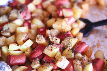 Golden baked sausages potatoes Homestyle sausage potato dish
