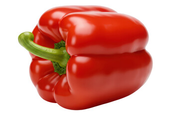 A bright red bell pepper stands out against the darkness with vivid color