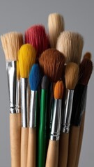 Fototapeta premium Artistic brush collection studio space photography light and airy environment close-up view uplifting pastel colors for creative inspiration