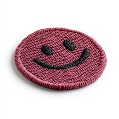 Close Up of Maroon Embroidered Smiley Face Patch on White Background
