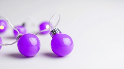 Purple Christmas Ornaments and Lights on White Background