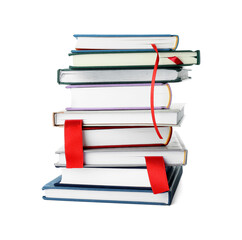 Books with red ribbon bookmarks isolated on white