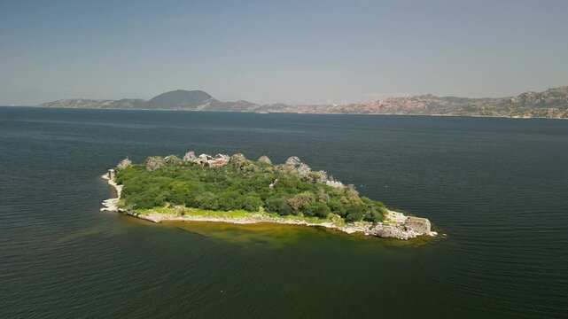 Diagonal flight over island on Lake Bafa in southwestern Turkey