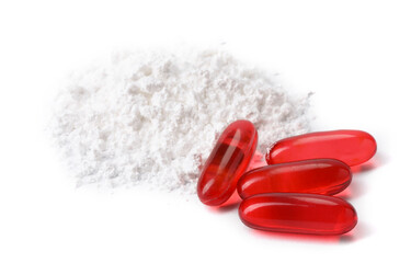 Collagen powder and pills isolated on white