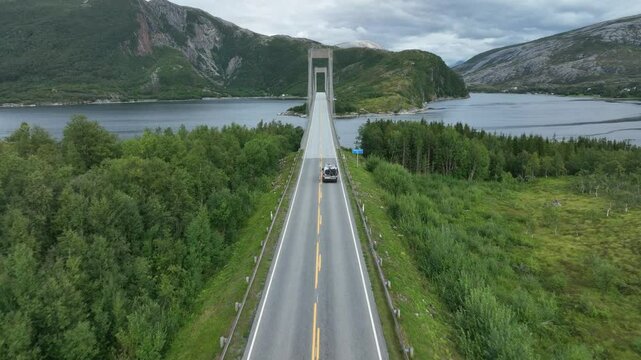 vehicle going on Kjellingstraumen bru bridge crossing the Kjellingsundet strait at the Beiar Fjord
