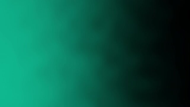 A smooth gradient of teal and dark green shades creating a calming, abstract background.