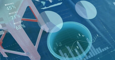 Image of data and graphs over stool and bucket on blue background