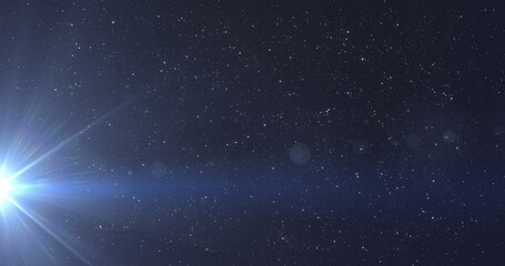 Image of glowing spots of lights over dark background