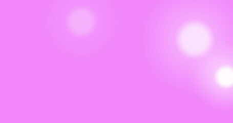 Image of glowing spots of lights over pink background