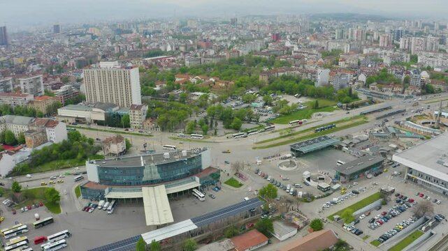 Establishing aerial footage of Sofia central station and city streets with traffic