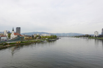 Naklejka premium A riverside embankment in Linz, the river Danube, Austria 