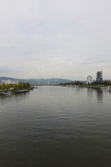 Fototapeta premium A riverside embankment in Linz, the river Danube, Austria 
