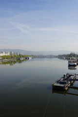 Fototapeta premium A riverside embankment in Linz, the river Danube, Austria 