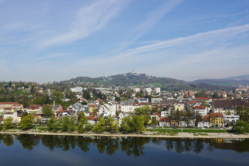 Obraz premium A riverside embankment in Linz, the river Danube, Austria 