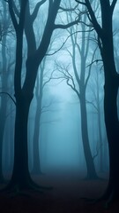 Fog Rolling Through Dark Forest with Bare Trees