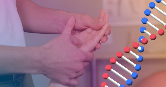 Image of dna strand over caucasian male massage therapist with female patient - Powered by Adobe