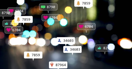 Image of social media icons and numbers over out of focus city lights