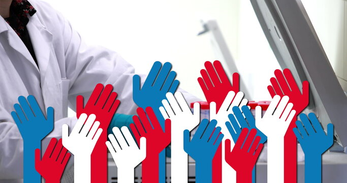 Image of red, blue and white hands over hands of male lab worker - Powered by Adobe