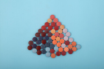 Synthetic food colorings in pills. Prohibited and permitted food additives with index E. Soluble pigments or Pressed dyes in tablet form