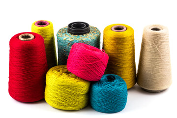 Skeins of different types of threads for sewing and knitting