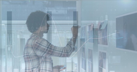 Image of financial data processing over african american businessmen