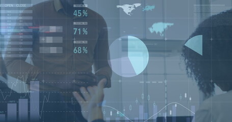 Image of financial data and graphs over happy diverse businesspeople talking in office
