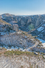 Beautiful landscape with monasteries and rock formations in Meteora in winter time, Greece.