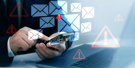 Email security and virus spam alert in email. Fake text email scam.Scammers online.Cyber scam. Spam email message on digital screen.