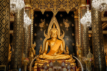 Phitsanulok, Thailand - 17 Nov 2024: Phra Buddha Chinnarat is located at Wat Phra Sri Rattana Mahathat Woramahawihan. It is one of the most beautiful and most popularly replicated in Thailand.