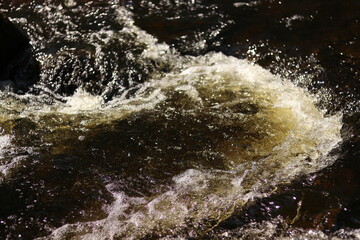 water flowing into the water