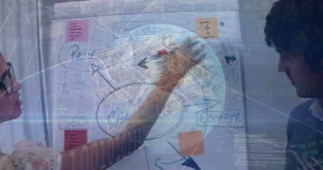 Data processing over spinning globe against diverse office colleagues discussing over whiteboard